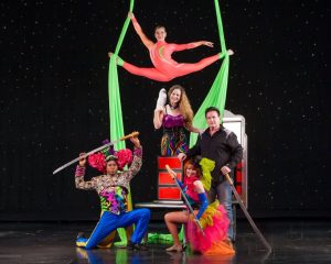Hamners Cast in Various Colorful Costumes