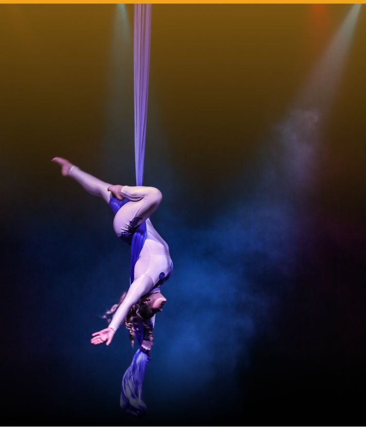 Aerialist Performing With Silk Rope